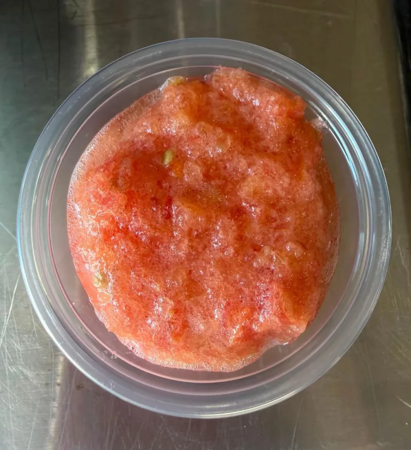 Grated tomato sauce in a serving cup